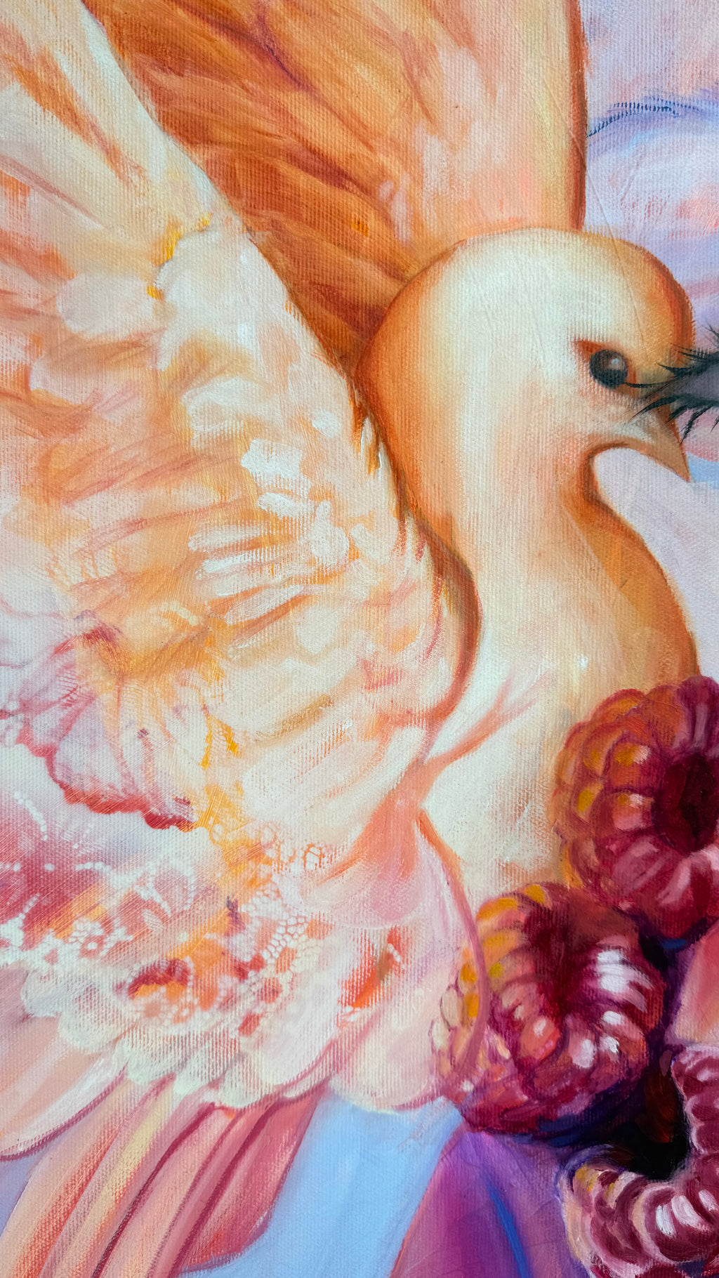 Close-up of a flamingo with pink feathers and a blue background