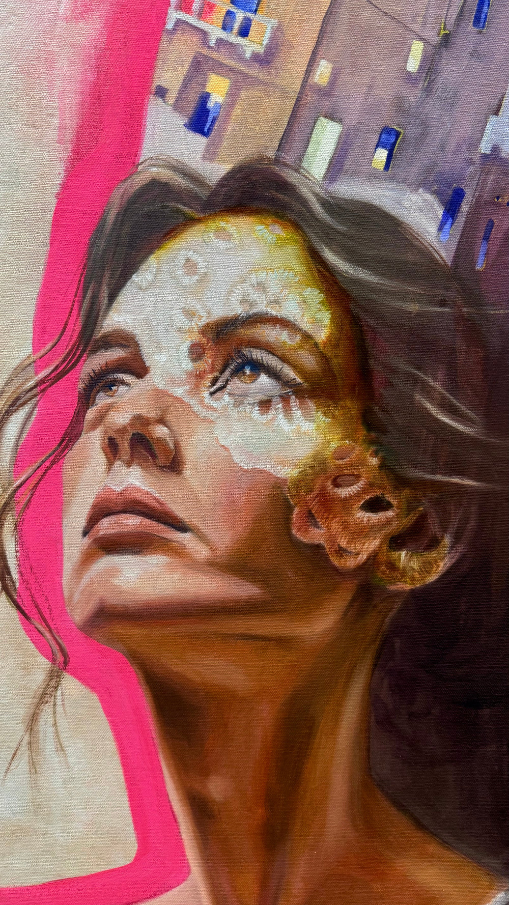 Artistic depiction of a woman's face with a cityscape background