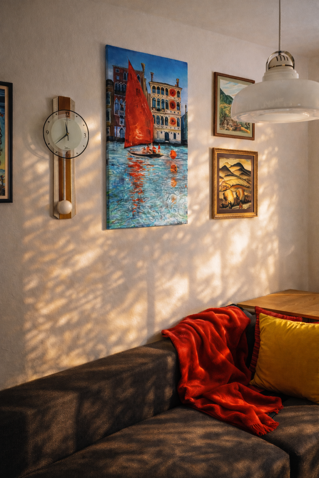 Original Venice oil painting Legend of Dario’s Palace with red sailboat by Zuzana Kochanková displayed in collector living room interior with warm evening light