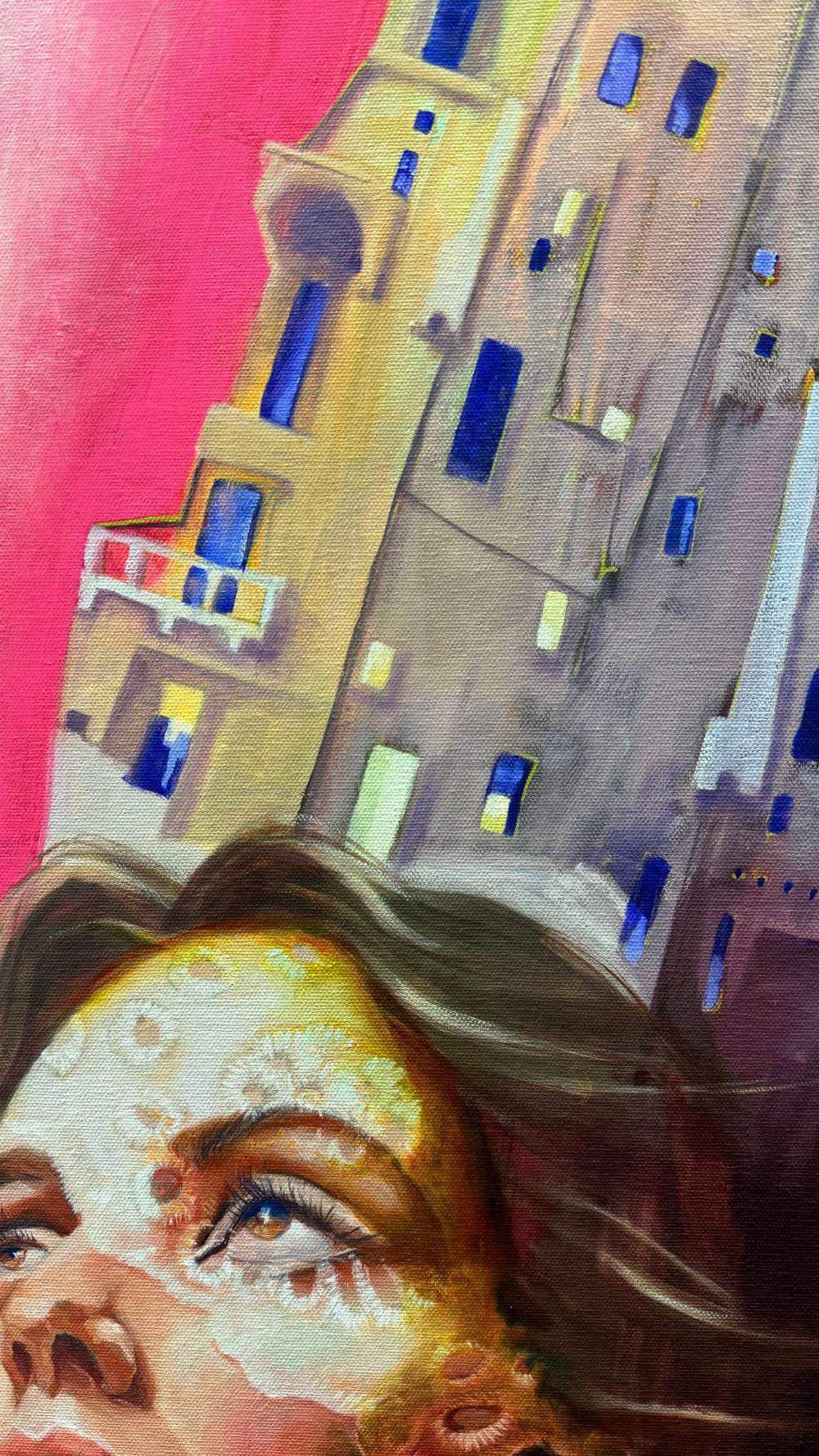 Close-up of a painting with architectural details and a person's face.